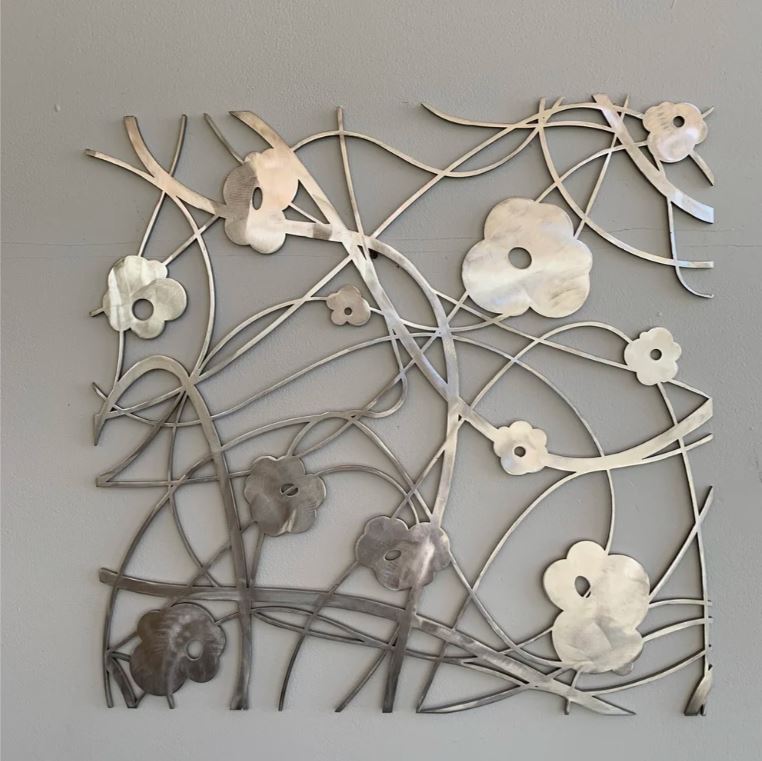 Steve Bickley — Silver Phlox, stainless steel floral relief with clustered petal forms