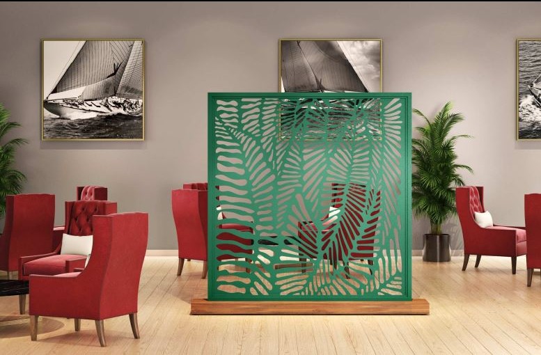 Custom laser-cut architectural screen in a hospitality lobby